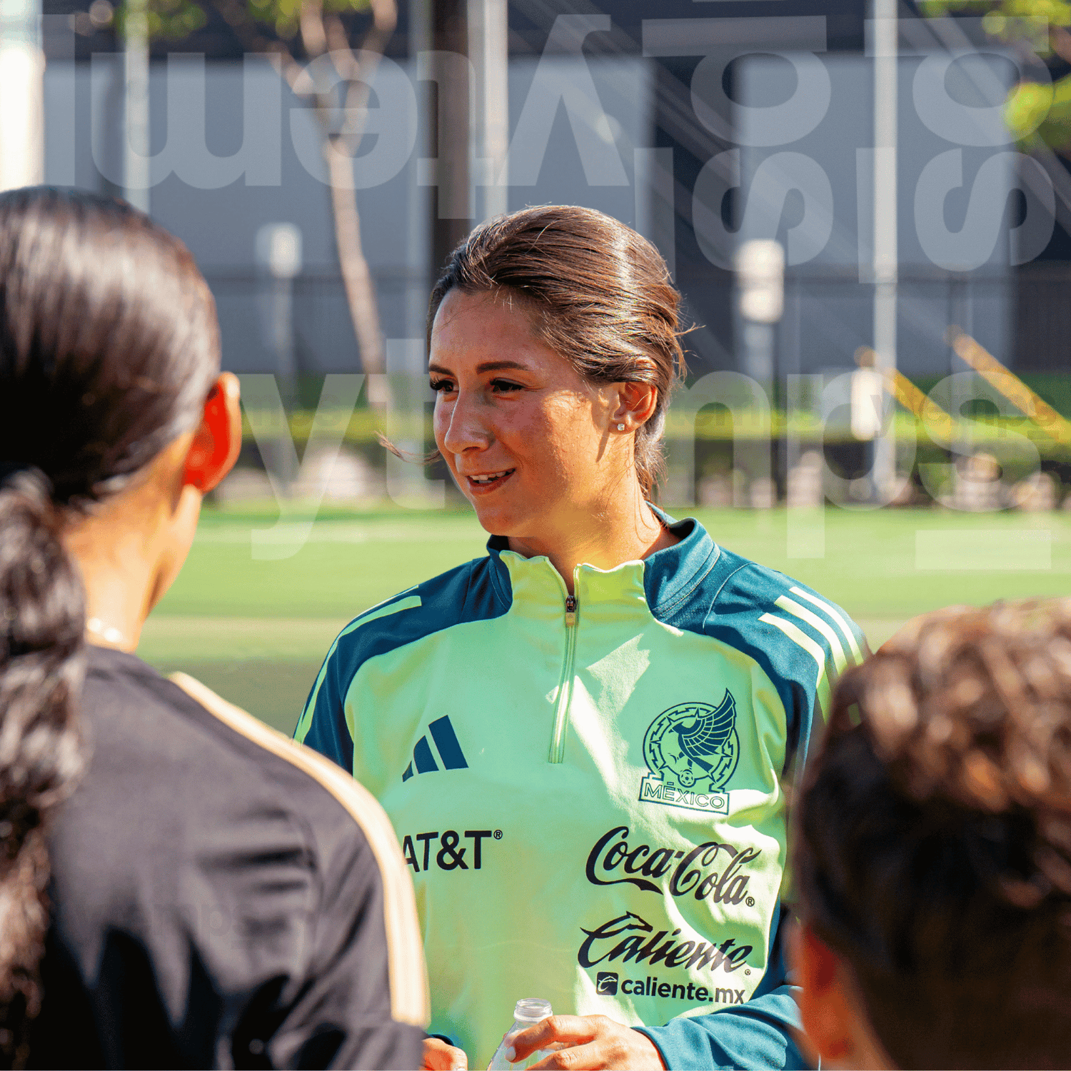 Pro soccer player Valerie Vargas giving advice to kids